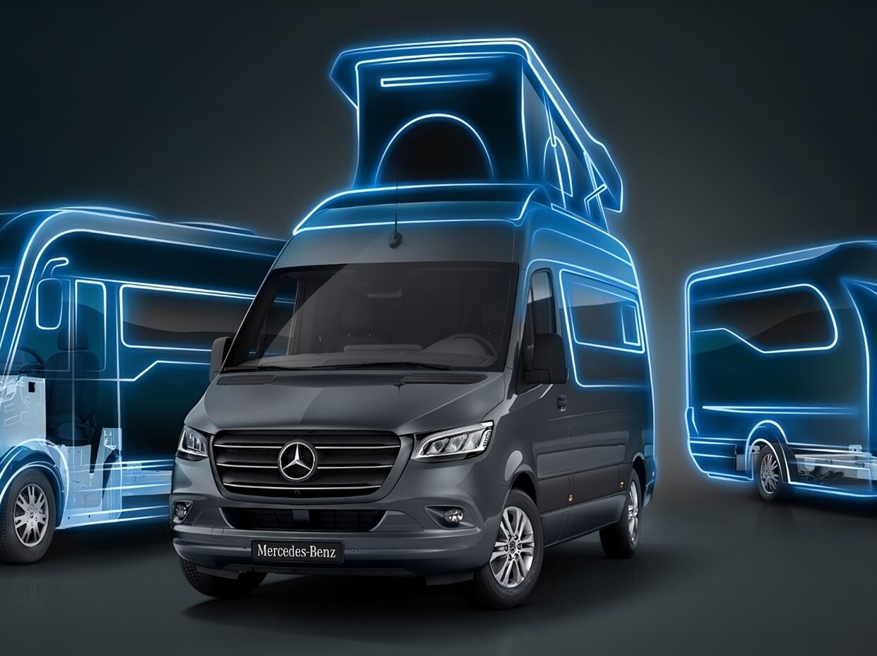 Egy Mercedes-Benz Sprinter lakóautó egy festői folyóparton parkol.