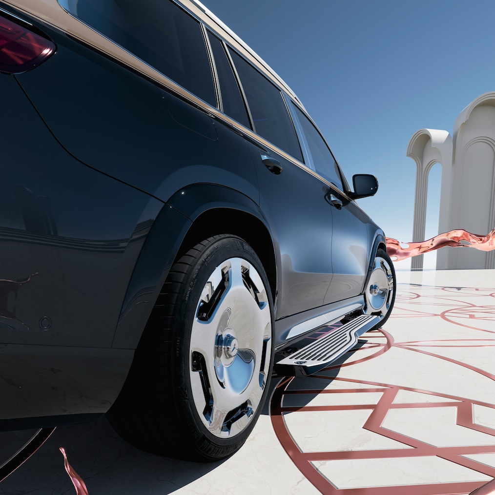 Függőleges rálátás a Mercedes-Maybach GLS 600 modellre felülről, nyitott ajtókkal és kiengedett fellépőkkel.