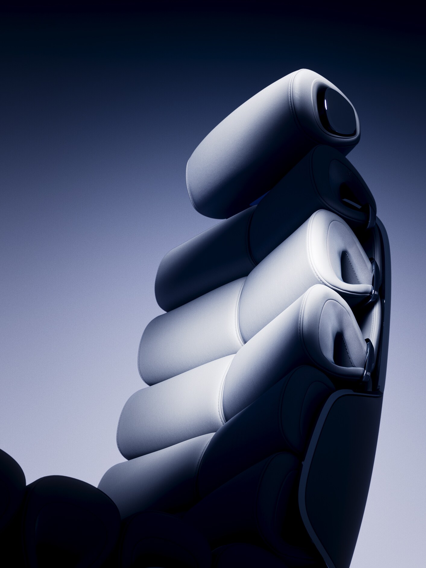 Az egyszemélyes ülés közelről. Láthatók a rugalmas hengerpárnák, amelyek egyedi futurisztikus kialakítást kölcsönöznek az ülésnek.