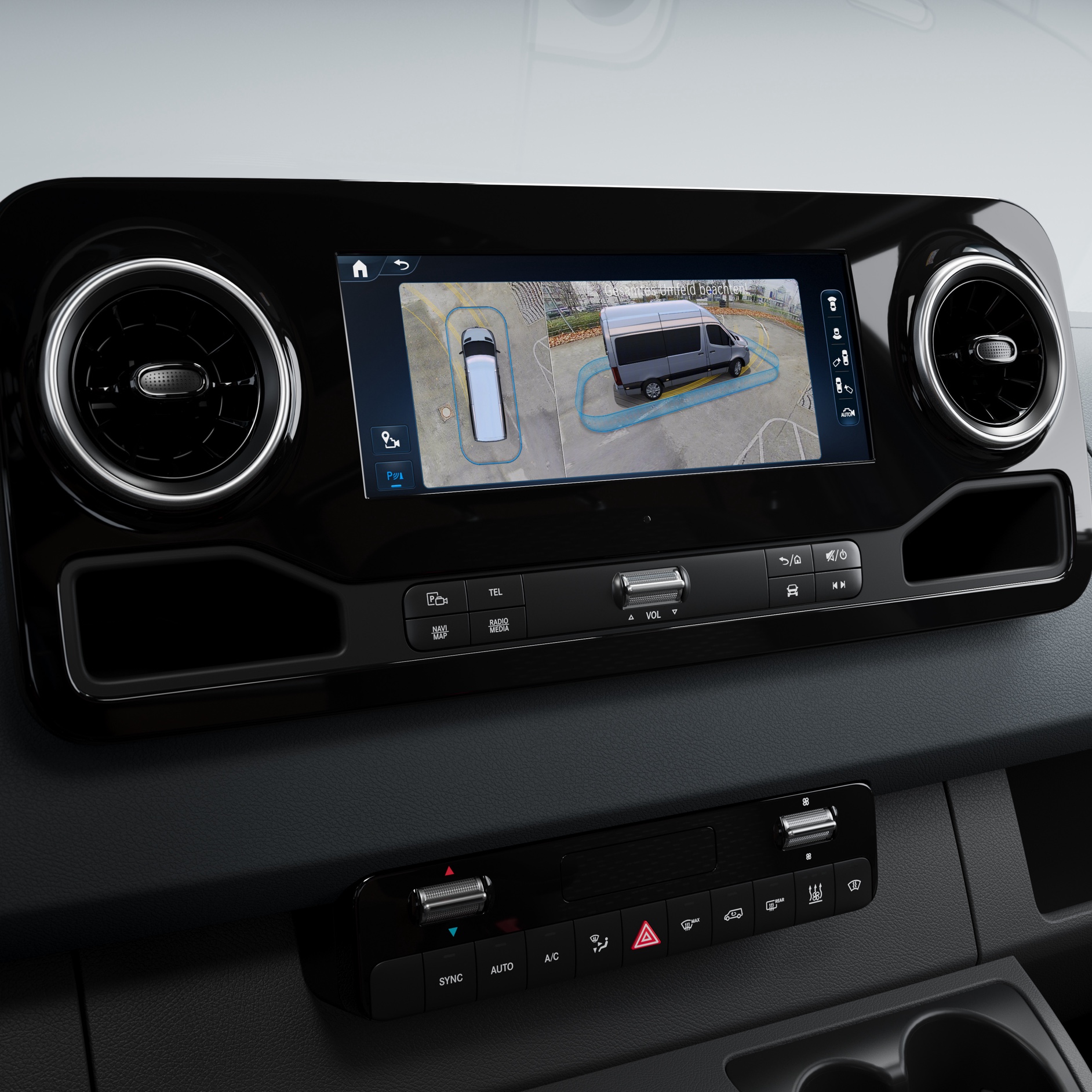 Járműjellemzők | Sprinter | Mercedes-Benz A Mercedes-Benz Sprinterhez tartozó parkolási csomag 360°-os körpanorámás kijelzője.